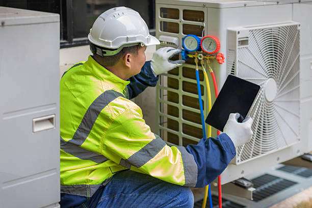 Professional Hvac technician working in Ferguson, NC